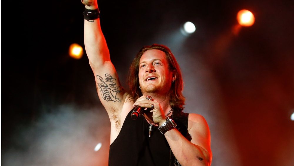 Take a listen to Tyler Hubbard's solo single “902180”